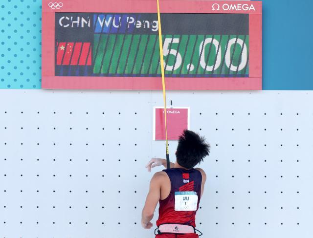 1723083308363057153.jpg 巴黎奥运会丨攀岩——男子速度资格赛:伍鹏晋级+XxjpseC007215_20240807_MVPFN0A001.jpg